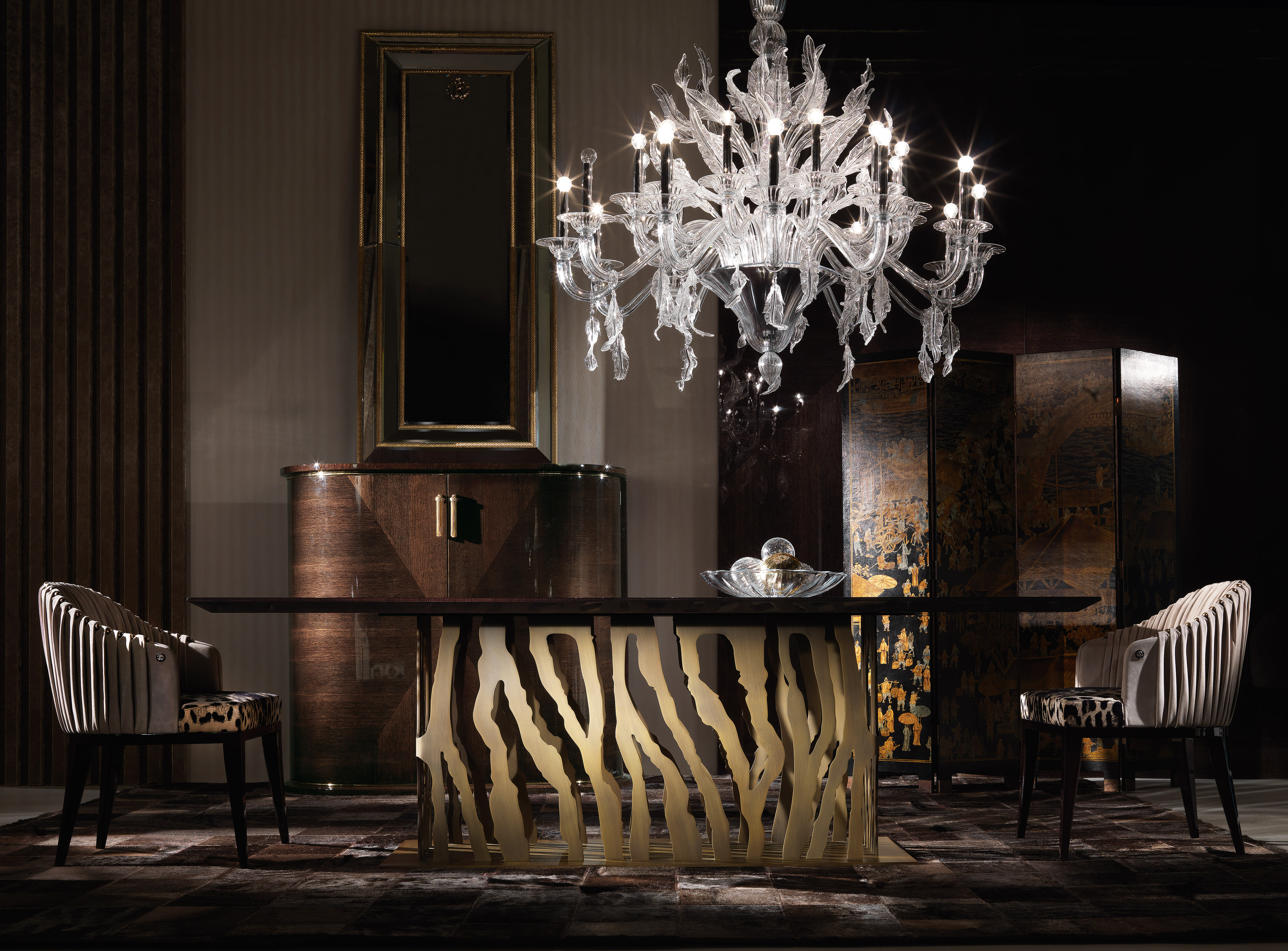 Dining room — tiger-stripe gold table and Murano chandelier